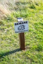 A caution signboard for hikers in Scotts Bluffs National Monument, Nebraska