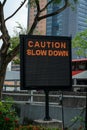 Caution slowdown. Traffic information sign Royalty Free Stock Photo