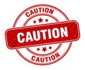 caution stamp. caution round grunge sign. Royalty Free Stock Photo