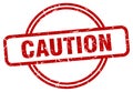 caution stamp. caution round grunge sign. Royalty Free Stock Photo