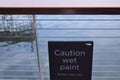 Black caution sign on a bridge Royalty Free Stock Photo