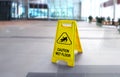 Caution wet slippery floor sign in the building Royalty Free Stock Photo