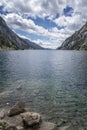 Cavallers reservoir surrounded by high mountains , river Noguera de Tor in Ribagorza, Boi valley, in the Lleida Pyrenees,