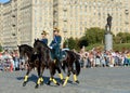 The cavalry honorary escort of the Presidential Regiment speaks against the background of the monument to the heroes of the First