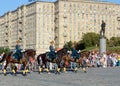 The cavalry honorary escort of the Presidential Regiment speaks against the background of the monument to the heroes of the First