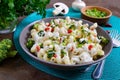 Cavatappi pasta with broccoli, red pepper and cream sauce in a bowl. Vegetarian dish. Delicious healthy food. Proper nutrition Royalty Free Stock Photo