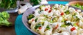 Cavatappi pasta with broccoli, red pepper and cream sauce in a bowl. Vegetarian dish. Delicious healthy food. Proper nutrition. Royalty Free Stock Photo