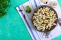 Cavatappi pasta with broccoli, red pepper and cream sauce in a bowl. Vegetarian dish. Delicious wholesome food. Proper nutrition. Royalty Free Stock Photo