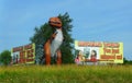 Cave City, Kentucky U.S.A - August 20, 2021 - The advertising sign and the large statue of Dinosaur World