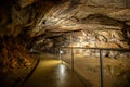 Cave with concrete footpath Royalty Free Stock Photo