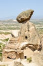 Cave dwelling inside triangular rock