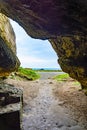 Secret beach cave exit Royalty Free Stock Photo