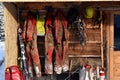 Cave exploration equipment hanged on a wooden cabin Royalty Free Stock Photo