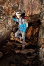 Cave exploration with helmet and headlight Royalty Free Stock Photo