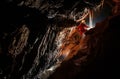 Cave explorer, speleologist exploring the underground