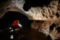 Cave explorer, speleologist exploring the underground Royalty Free Stock Photo
