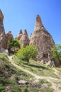 Cave houses carved into Tufa Rocks in Zelve Valley, Cappadocia, Anatolia, Turkey Royalty Free Stock Photo