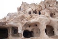 Cave houses in cones Uchisar castle, Cappadocia Royalty Free Stock Photo