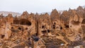 Cave houses and monasteries carved into tufa rocks at Zelve Valley in Cappadocia, Turkey Royalty Free Stock Photo