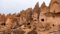 Cave houses and monasteries carved into tufa rocks at Zelve Valley in Cappadocia, Turkey Royalty Free Stock Photo