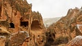 Cave houses and monasteries carved into tufa rocks at Zelve Valley in Cappadocia, Turkey Royalty Free Stock Photo