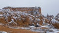 Cave houses surrounded by rock formations in Cappadocia, Turkey Royalty Free Stock Photo