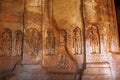 Cave 4 : Jaina Tirthankara images engraved on the inner pillars and walls. There are idols of Yakshas, Yakshis, Padmavati and othe Royalty Free Stock Photo