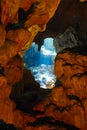Cave light hole through rock, Vietnam
