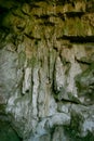 cave model in karst mountain with stalactite rocks. Royalty Free Stock Photo