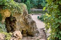 Cave next to lake in park