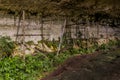 Cave with old wooden buildings remnants in the Niah National Park, Malays Royalty Free Stock Photo