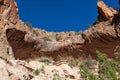 Cave Opening High Up a Cliff Royalty Free Stock Photo