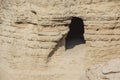 A cave opening in a Qumran hillside Royalty Free Stock Photo