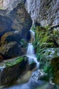 Cave river and waterfall