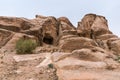 The cave in the rock near the road leading to Petra - the capital of the Nabatean kingdom in Wadi Musa city in Jordan Royalty Free Stock Photo