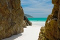 Cave in the rocks in a Crystalline clear sea Royalty Free Stock Photo