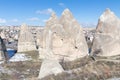 Cave, rocks and mountains in Goreme valley, Cappadocia, Turkey