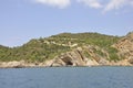 Cave in the Rugged foreshore of Thassos island in Greece Royalty Free Stock Photo