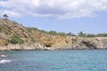 Cave in the Rugged foreshore of Thassos island in Greece Royalty Free Stock Photo