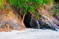 Cave at the sea beach. under the mountain. Royalty Free Stock Photo