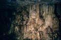 Cave with speleothem, stalactites, stalagmites and stalagnates in Adygeya