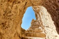 Cave staircase and sky