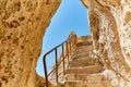 Cave staircase and sky Royalty Free Stock Photo