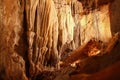 Cave stalactites underground cavern magic light Royalty Free Stock Photo