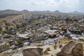 Cave town Uchisar from the ancient mountain fortress. Cappadocia, Turkey Royalty Free Stock Photo