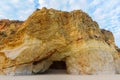 Cave under a cliff on a beach in Portimao, Portugal