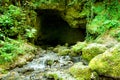 Cave and water cascades in wilderness