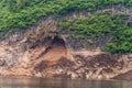 Cave at water edge over Daning River, Wuchan, China