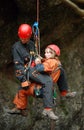 Caver abseiling in a pothole.