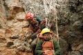 Caver abseiling in a pothole.